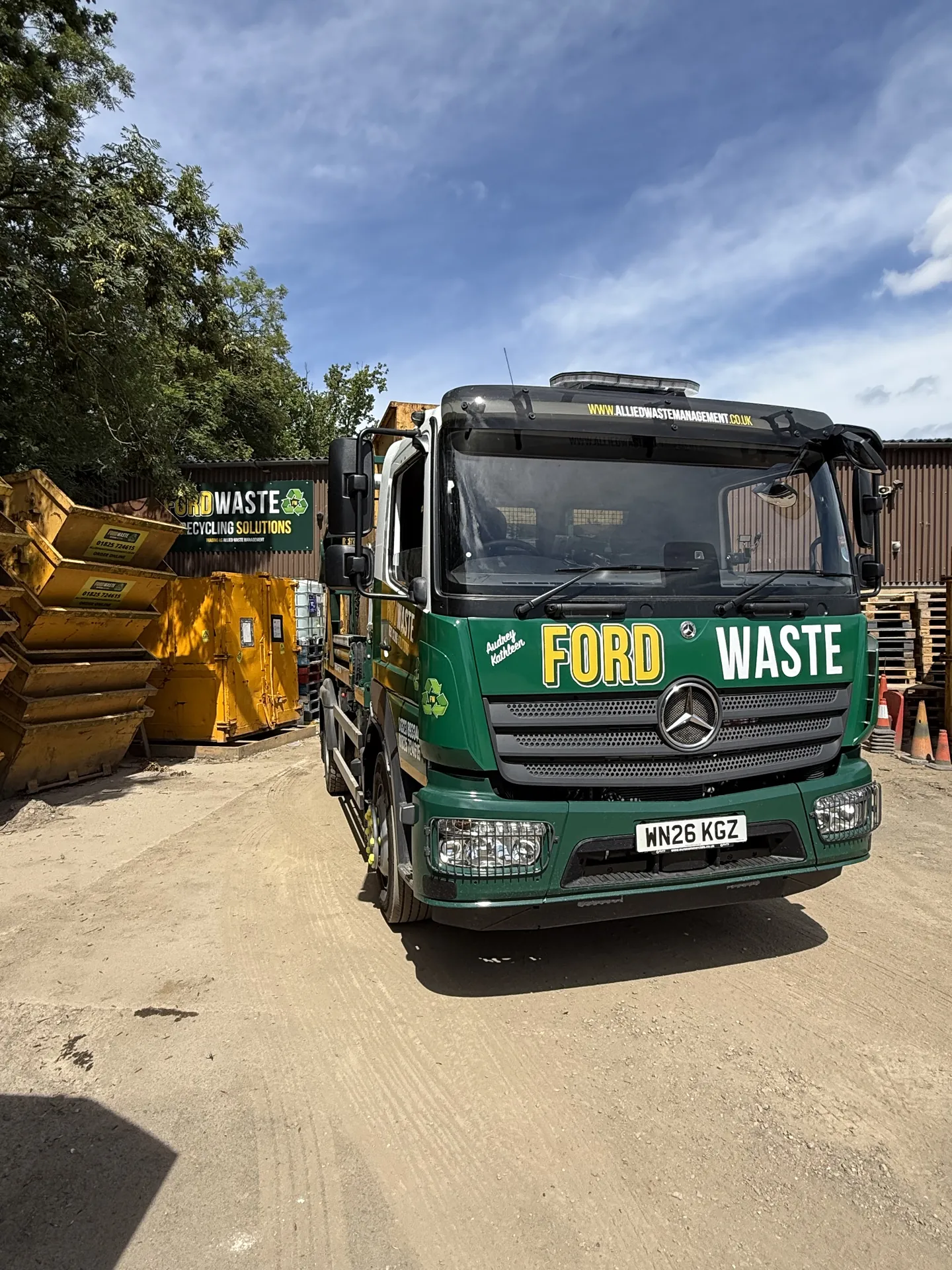 A Ford Waste skip lorry in the yard — the fleet behind trade accounts