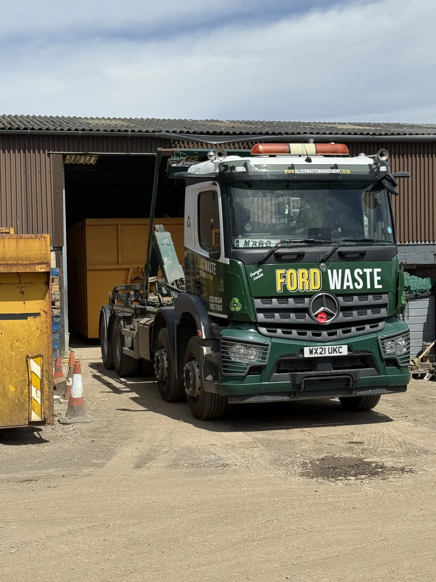 A Ford Waste skip lorry at the Uckfield depot, loading for the morning round